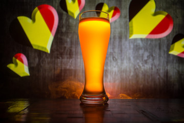 Wall Mural - Soccer 2018. Creative concept. Single beer glass with beer on table ready to drink. Support your country with beer concept. Selective focus