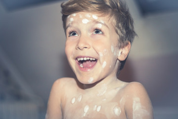 Happy kid with chickenpox.