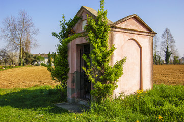 Religious shrine on the banks of the River Po in the Venetia region, Venice, Italy