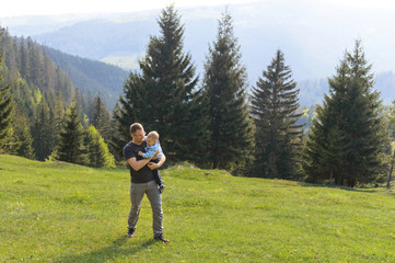 Wall Mural - Father Holding Son in Hands