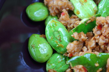 Canvas Print - fried pork with stink bean food in thailand