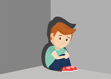 Sad Boy Sitting In A Corner.