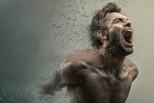 Screaming Frustrated Man Dispersing And Disintegrating Into Particles, Agonizing And Torturing Expression
