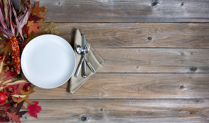 Wall Mural - Autumn background with dinnerware setting for Thanksgiving holiday concept