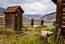 Old Wooden Outhouse In The Mountains