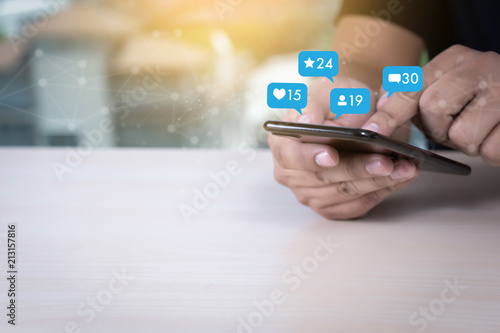 Fotomural Young man using smart phone Social media and social network Marketing concept P