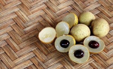 longan. fresh on wooden background