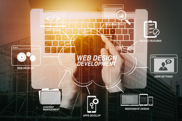 Developing programming and coding technologies with Website design in virtual diagram.hand working smartphone and laptop computer with city.