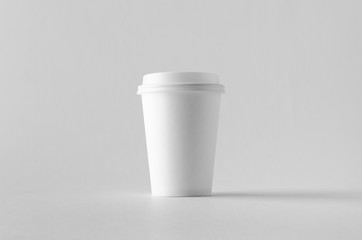 Canvas Print - 12 oz. white coffee paper cup mock-up with lid.