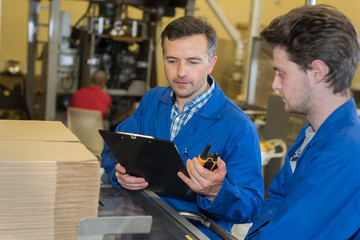 industrial trainer at work with trainee