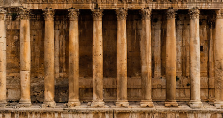 Frontal view of a colonnade - Row of columns of an ancient Roman temple ruin (Bacchus temple in Baalbek)