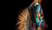 Native American Indian. Close Up Of Colorful Dressed Native Man Isolated On Black Background.