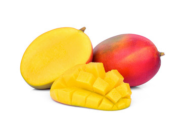 Wall Mural - whole and half ripe mango fruit with mango cubes isolated on white background