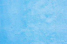 Background Of A Blue Stucco Coated And Painted Exterior, Rough Cast Of Cement And Concrete Wall Texture, Decorative Coating