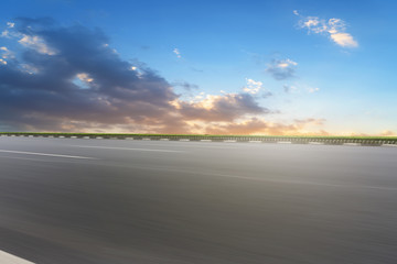 Empty highway asphalt road and beautiful sky landscape