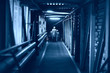 © kichigin19 - workers  helmets at the factory, view from the back, group of workers,  change of workers in the factory, people go in helmets and uniforms for an industrial enterprise