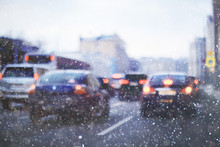 Snow Transport Road City / Landscape In A Night City In Winter, Cars On The Road In Traffic Jam In Cold Weather, Snow