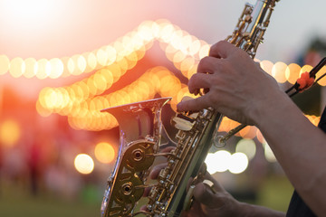 International jazz day and World Jazz festival. Saxophone, music instrument played by saxophonist player musician in fest.