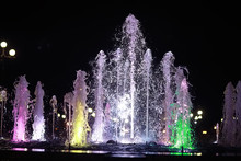 Colorful Night Fountains / Jets Of Colored Water In A Fountain, Night Illumination In The City, Tourist Object Art