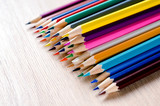 Fototapeta Tęcza - Colored pencils background. Close up