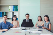 © A Stockphoto - Professional team business smiling at meeting in office