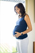© AntonioDiaz - Pregnant Woman Daydreaming By Window At Home