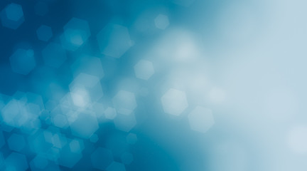 Wall Mural - blue hexagon bokeh on black background blurred light, abstract blurred gradient background in bright