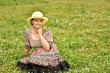 © st_fox - woman is sitting on a meadow