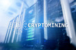 © Funtap - Cryptocurrency mining concept on server room background.