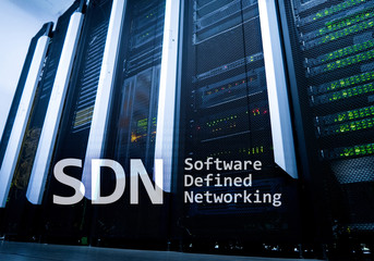 Wall Mural - SDN, Software defined networking concept on modern server room background.