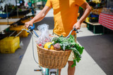 Fototapeta  - People buying fruits and vegetables. Summer outdoors farm market shopping background. Real purchasing selling natural healthy lifestyle candid closeup image