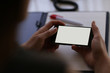 © Fernando - secretary, ejecutive doing transactions by phone with credit card