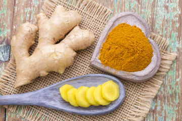 Canvas Print - ginger roots and turmeric on the table, top view