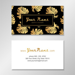 Wall Mural - Vector business card template with golden monstera palm leaves on black background and place for your text.