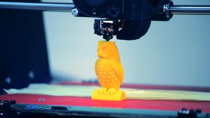 3D printer working. Fused deposition modeling, FDM. 3D printer printing an object from plastic. Automatic three dimensional 3d printer performs plastic. Progressive additive technology for 3d printing