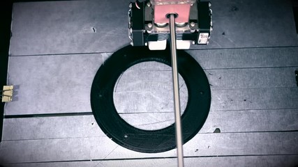 3D printer working. Fused deposition modeling, FDM. 3D printer printing an object from plastic. Automatic three dimensional 3d printer performs plastic. Progressive additive technology for 3d printing