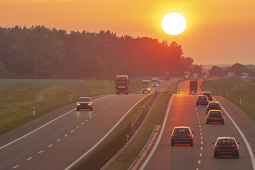 traffic on the Polish highway during sunset