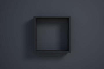 black picture frame on black wall