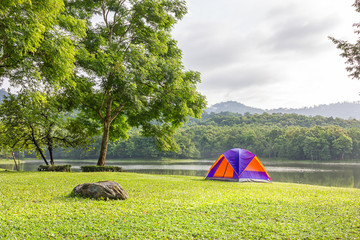 dome tent camping at lake side