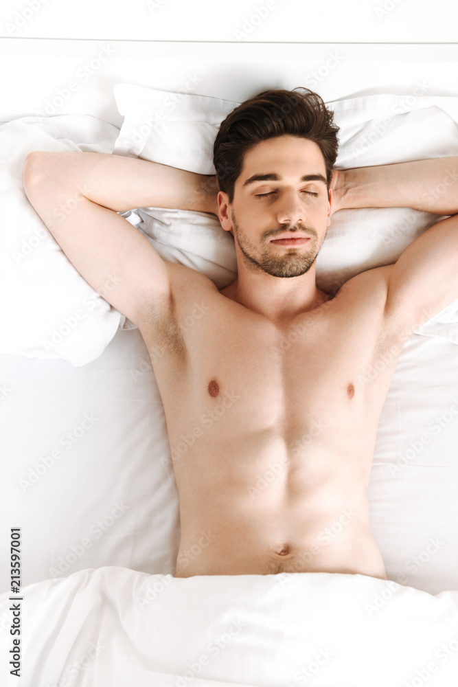 naked-man-sleeping-in-bed-indoors-at-home-stock-photo-adobe-stock