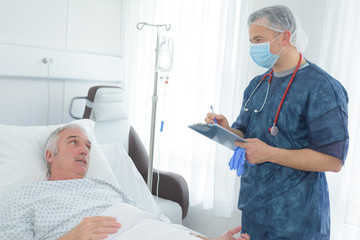 Wall Mural - doctor visit to the elderly patient