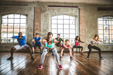 Wall Mural - Workout in a fitness gym