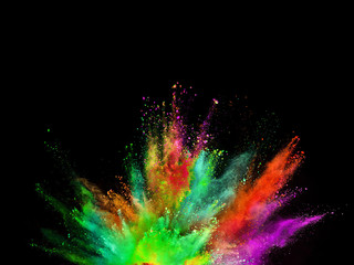 Wall Mural - Colored powder explosion on black background.