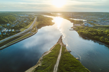 Confluence of two rivers (Namunas and Neris) in Kaunas old town, Lithuania. Drone aerial view.