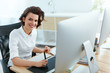 © puhhha - Woman Working On Project On Computer In Office