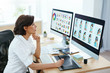 © puhhha - Web Designer Working On Computer