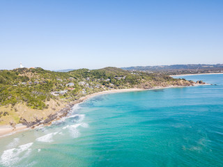 Canvas Print - The Pass and Wategoes Beach at Byron Bay from an aerial view with blue water