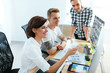 © puhhha - Web Design. Team Of Designers Working On Computer In Office
