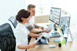 © puhhha - Web Designers Working On Project On Computer