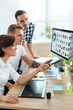 © puhhha - Web Design. Team Of Designers Working On Computer In Office